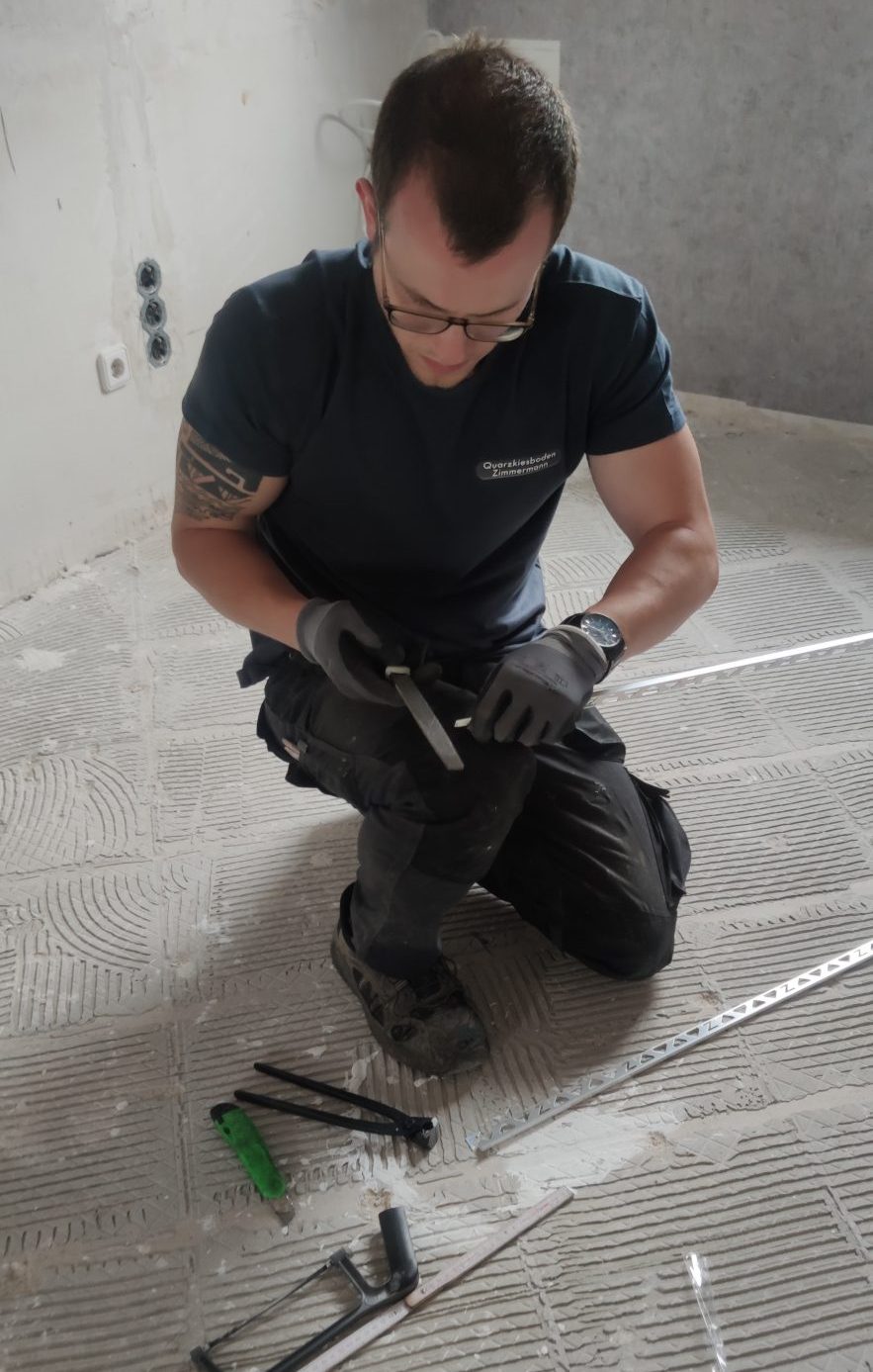 Handwerker Schiene Steinteppich